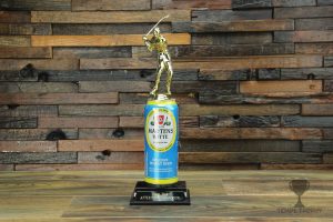 Custom golf trophy made with a beer can and a figurine of a golf player swinging hi