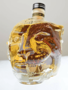 The glass version of the original Apacalypto Tequila half Mayan, half Jaguar bottle designed by Odd Rodney.