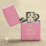 Engraved pink zippo lighter that says "You light up my life"