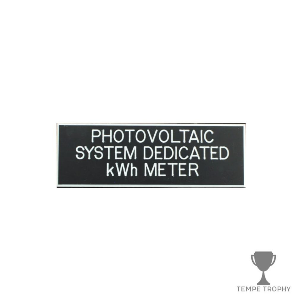 Black with White Text Plastic Panel Tag – "Photovoltaic System Dedicated kWh Meter"