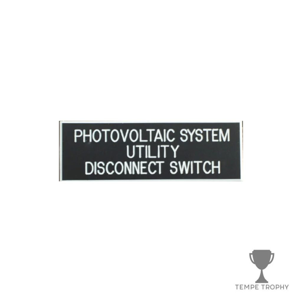 Black with White Text Plastic Panel Tag – "Photovoltaic System Utility Disconnect Switch" (3 lines)